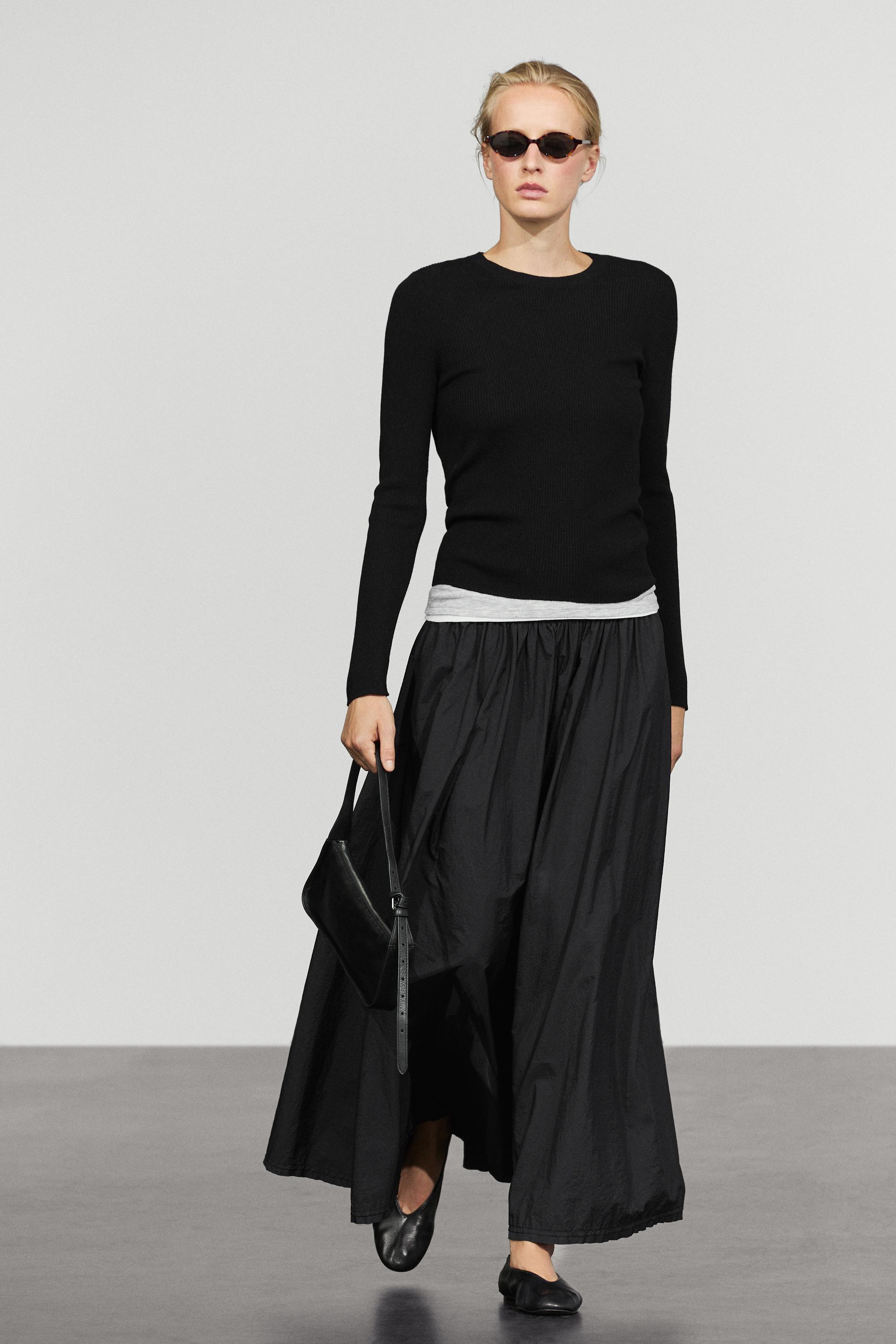 Ribbed knit round neck sweater